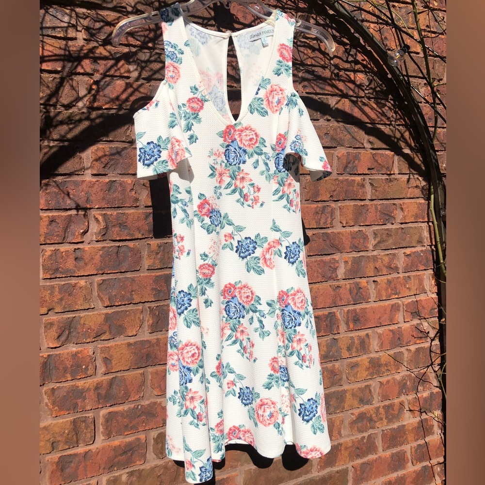 White Floral “Almost Famous” dress. Size small.